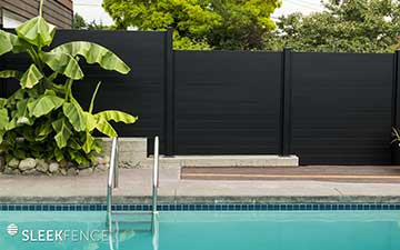 beautiful black fence surrounding pool