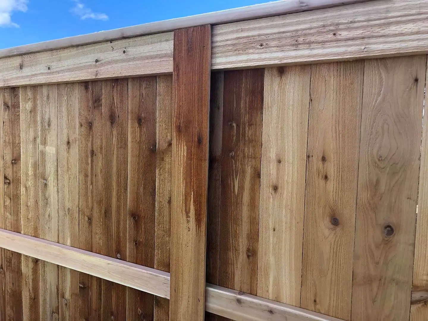 Full privacy wood fence with cap and trim
