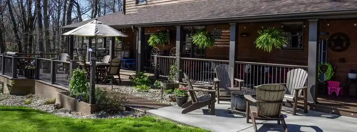 Composite deck and railings installed on the front of a home