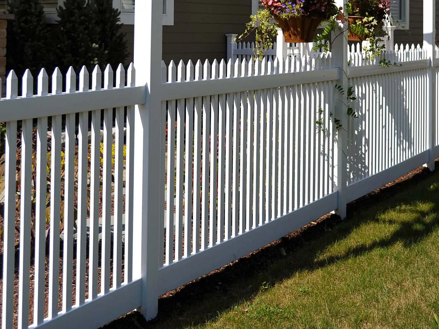 White vinyl semi-privacy picket fence