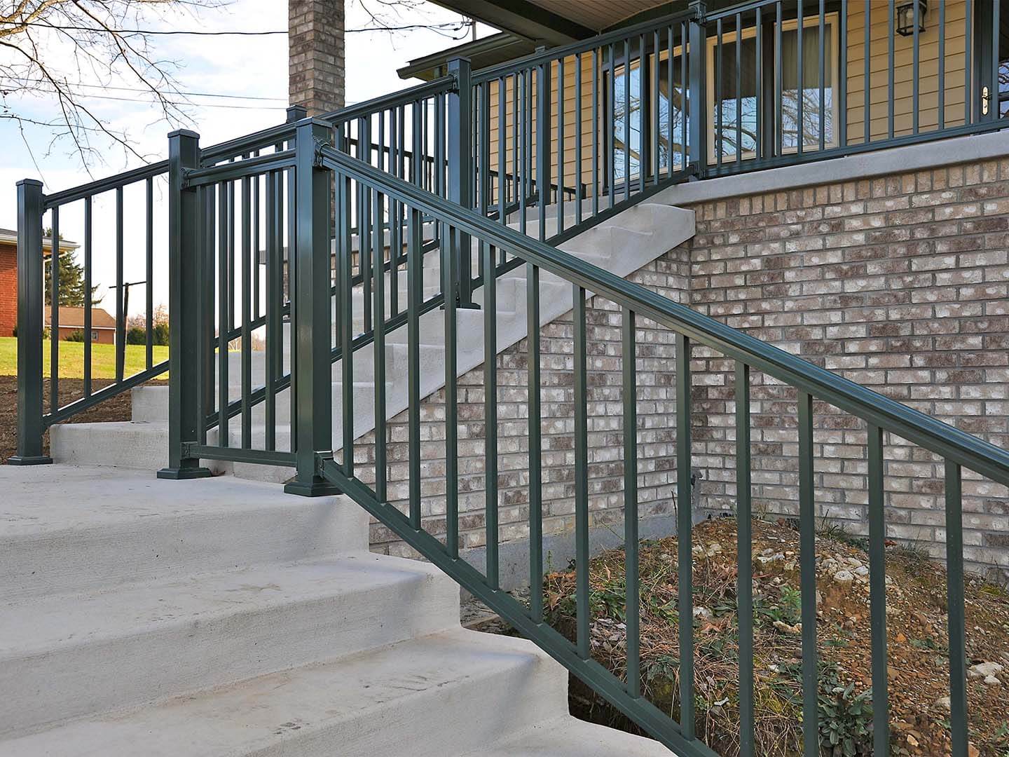Aluminum railings on an outdoor staircase installed off a front porch in Butler Pennsylvania