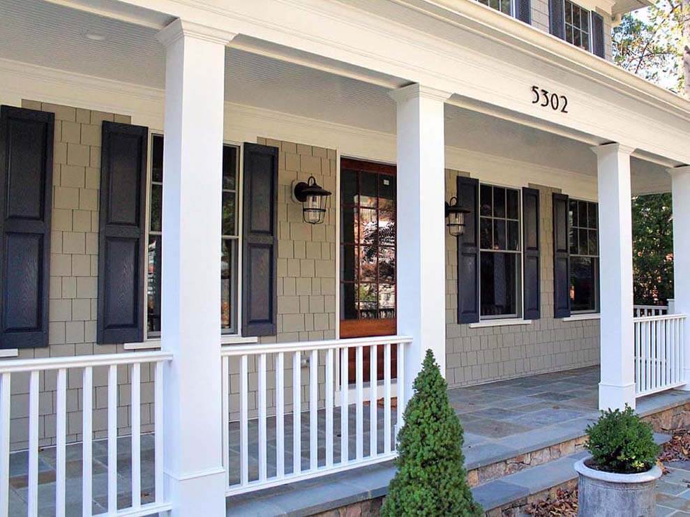 White aluminum railings along a front porch of a home in Western Pennsylvania