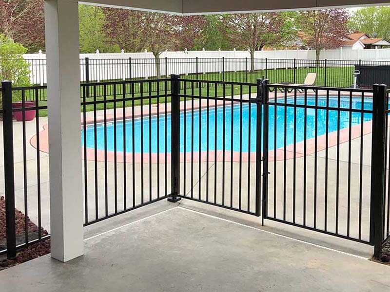 3 rail aluminum fence and gate surrounding a pool for a residential property in Western PA