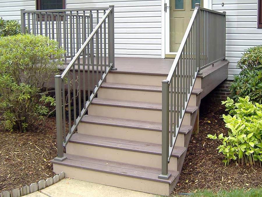 Silver aluminum railings along a staircase of a front porch for a home in Western Pennsylvania