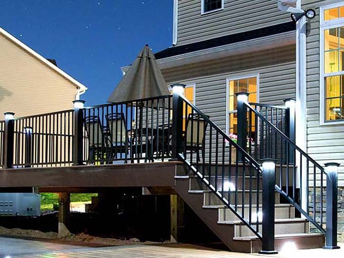 Black aluminum railings along a deck with a staircase installed in Western Pennsylvania