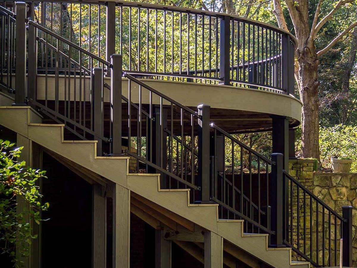 Aluminum railings around a circular deck and a staircase installed in Western Pennsylvania