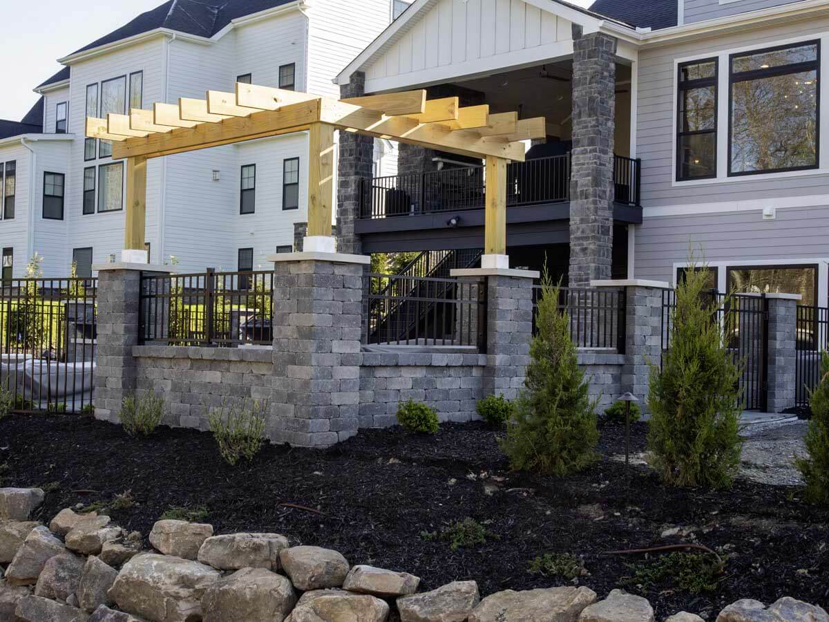3 rail aluminum railings around a porch with brick walls and columns in Western Pennsylvania