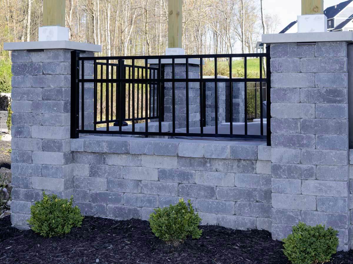 3 rail Aluminum railings installed along a bring wall with columns in Western Pennsylvania