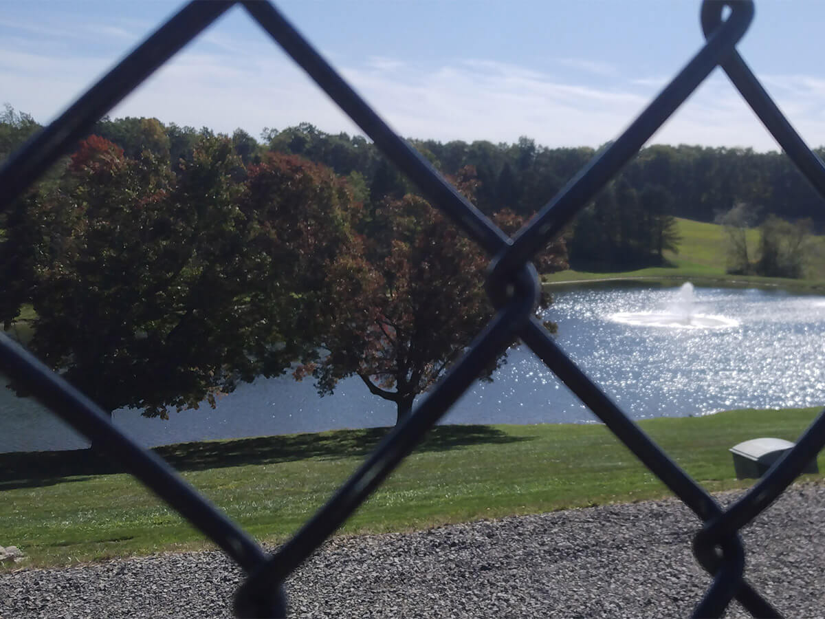 Chain Link Fence Enclosure Installed Behind Home in Western Pennsylvania