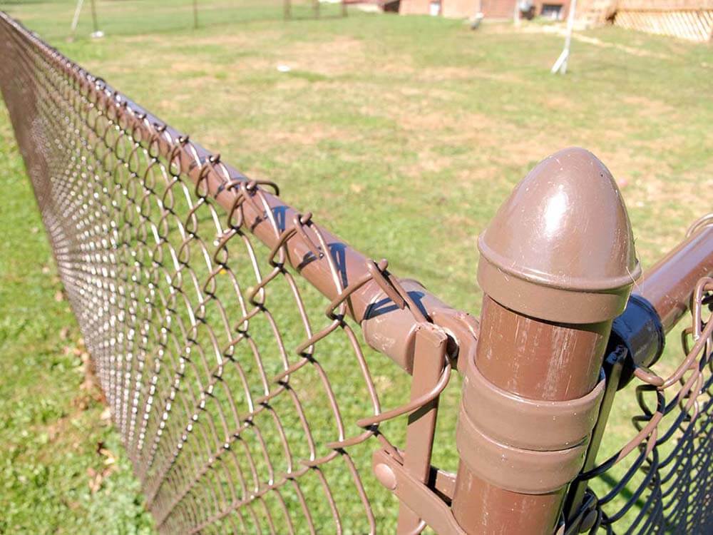 Brown chain link fence installed in Western Pennsylvania around a residential property