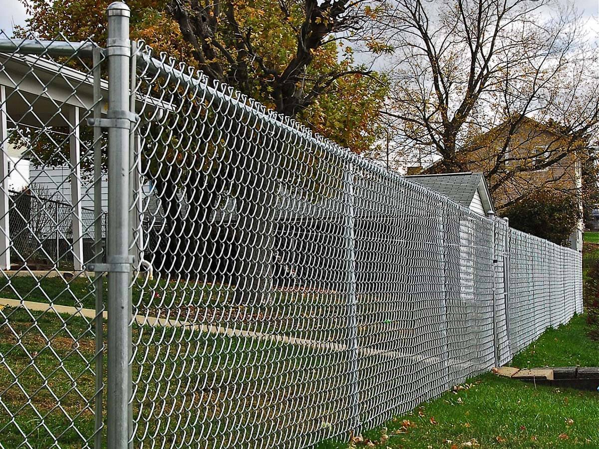 Galvanized chain link fence installed around a residential yard in Western Pennsylvania