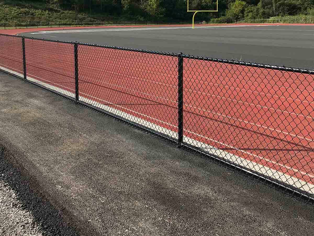 Black Chain Link Fence Installed Along Running Track in Western Pennsylvania