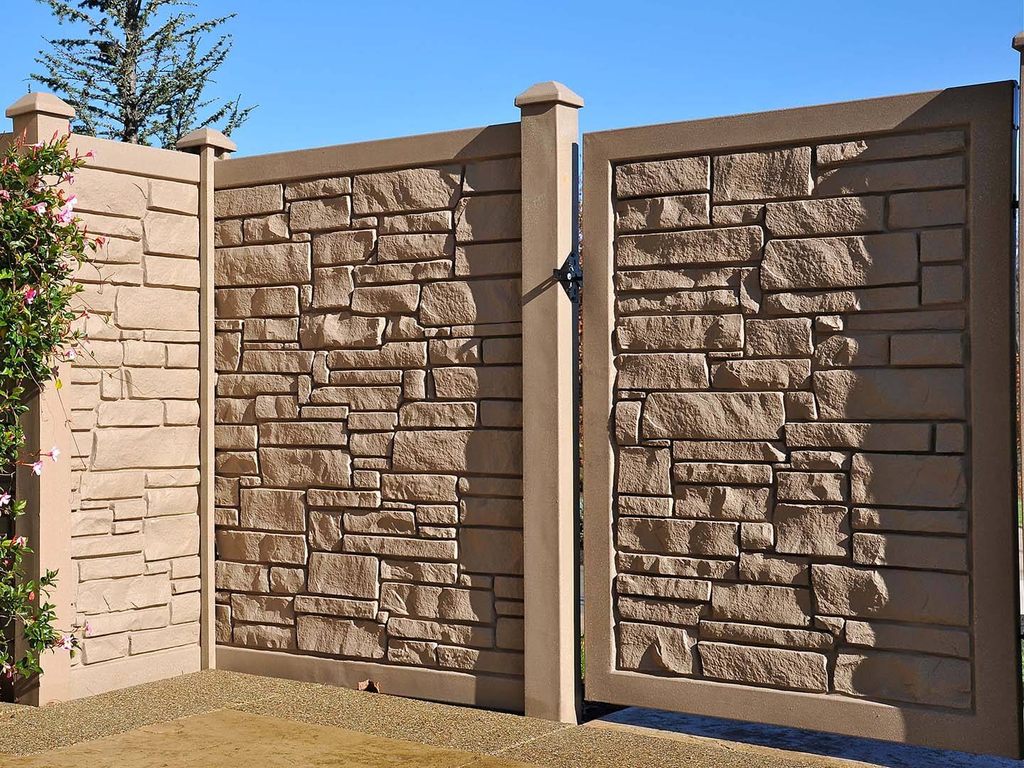Brown granite SimTek fence installed in Butler Pennsylvania for privacy