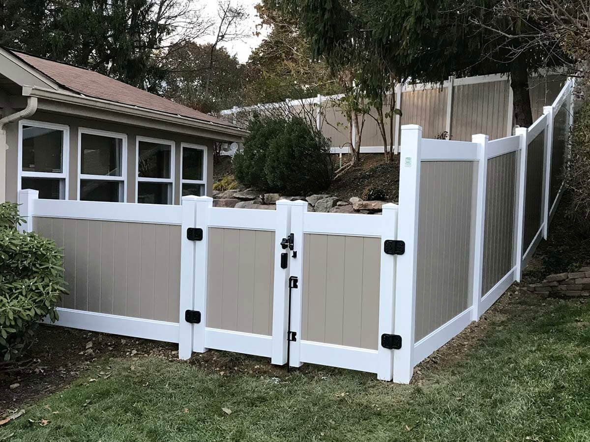 Vinyl Privacy Fence and Gate Installed Near Residential Home in Western Pennsylvania