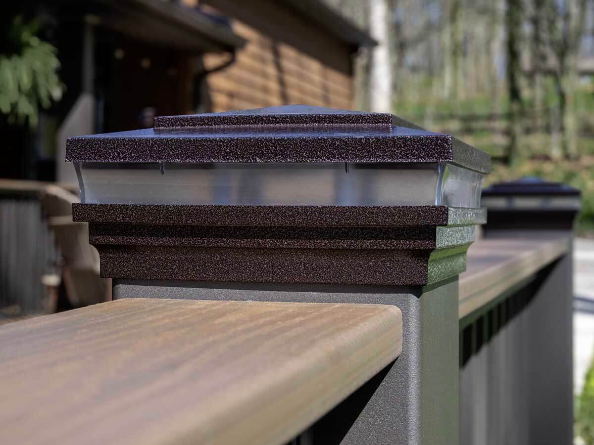 Close up of railing with lighted post caps that were installed for a deck in Western PA 