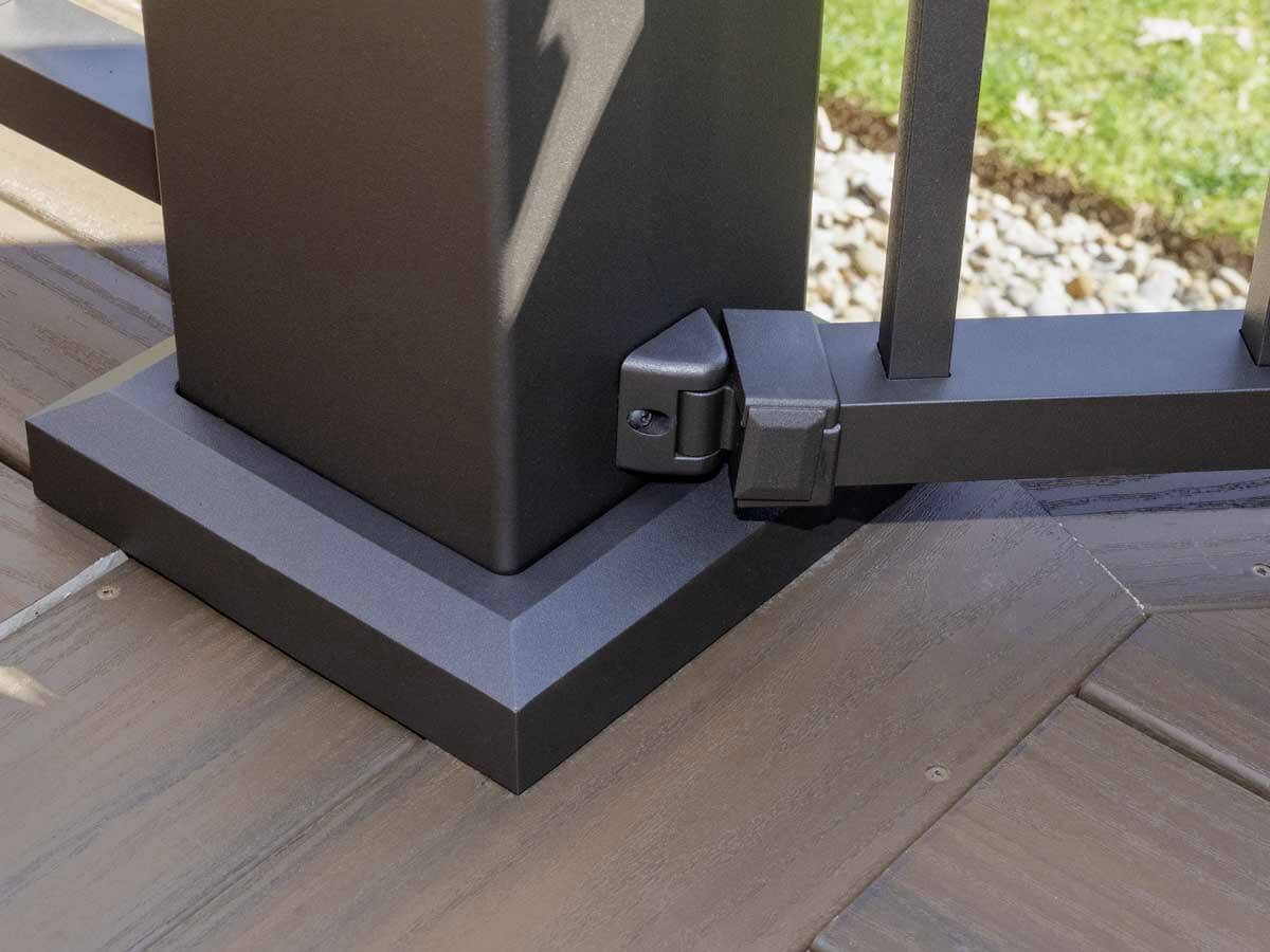 Close-up of a deck railing post with a durable post base trim installed in Western PA