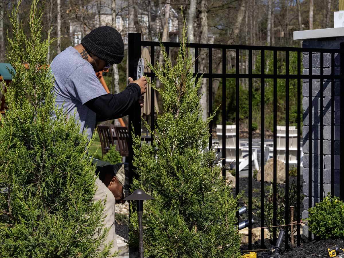 3 rail Aluminum fence being installed by Penn Fencing in Western PA