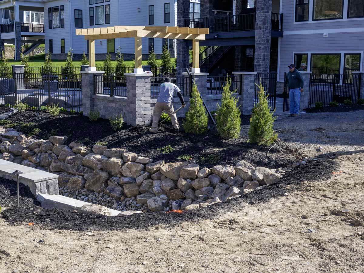 Installation of a metal fence and columns around a residential pool in Western PA