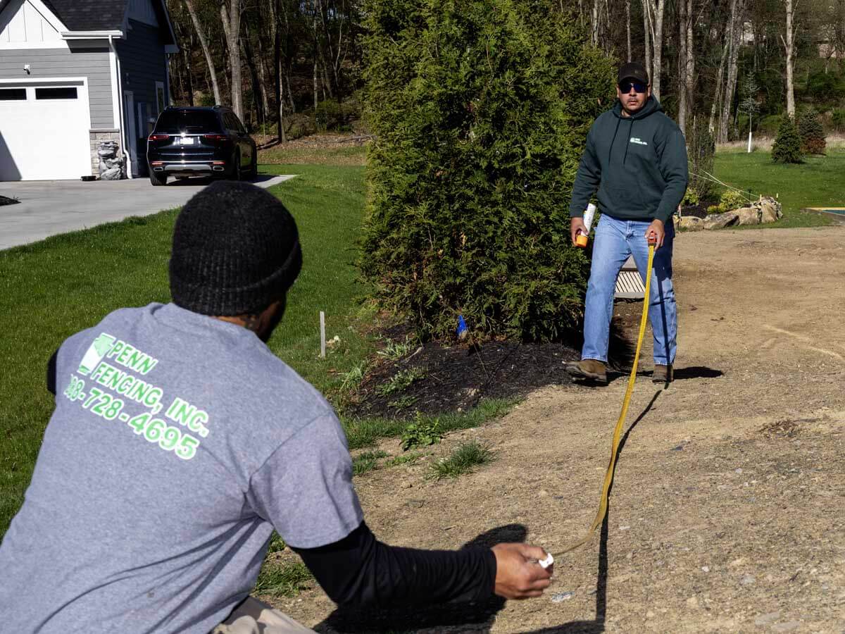 Penn Fencing preparing to install a fence in Western PA