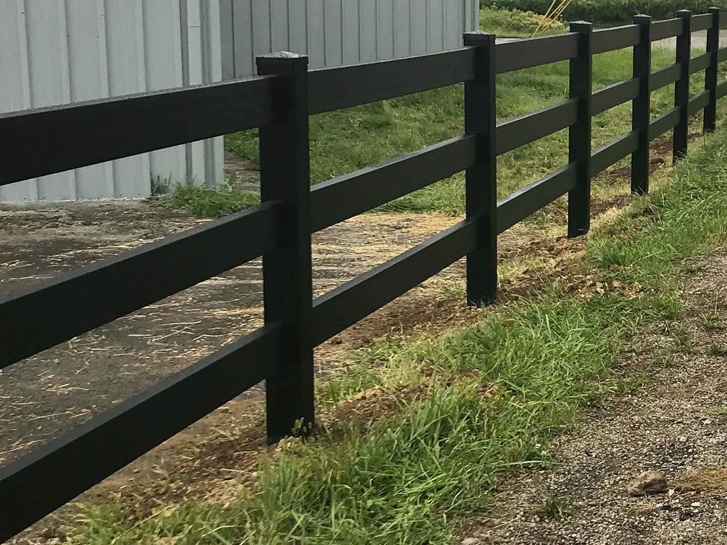 Black vinyl 3 rail fence installed by a fence company in Butler PA