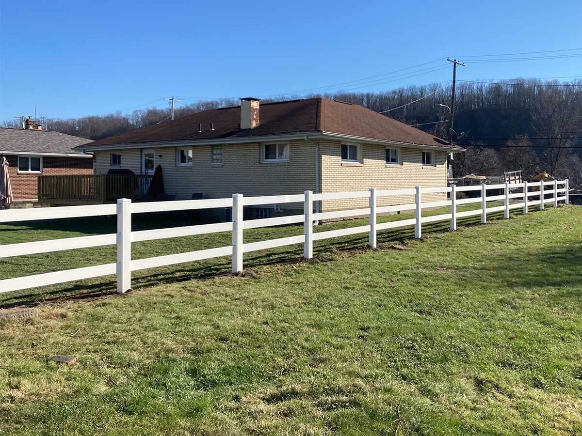 White Vinyl Ranch Fence Installed Along Residential Property in Western Pennsylvania