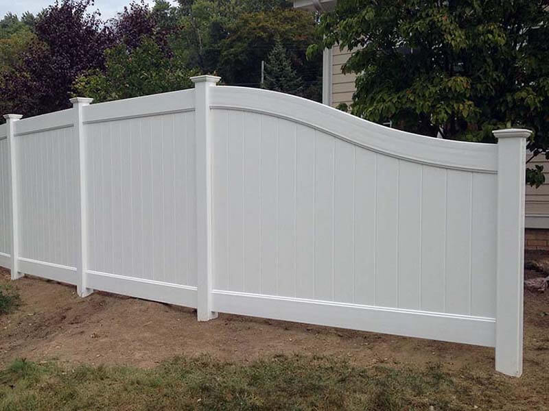 Full privacy white vinyl fence around a residential home in Western Pennsylvania