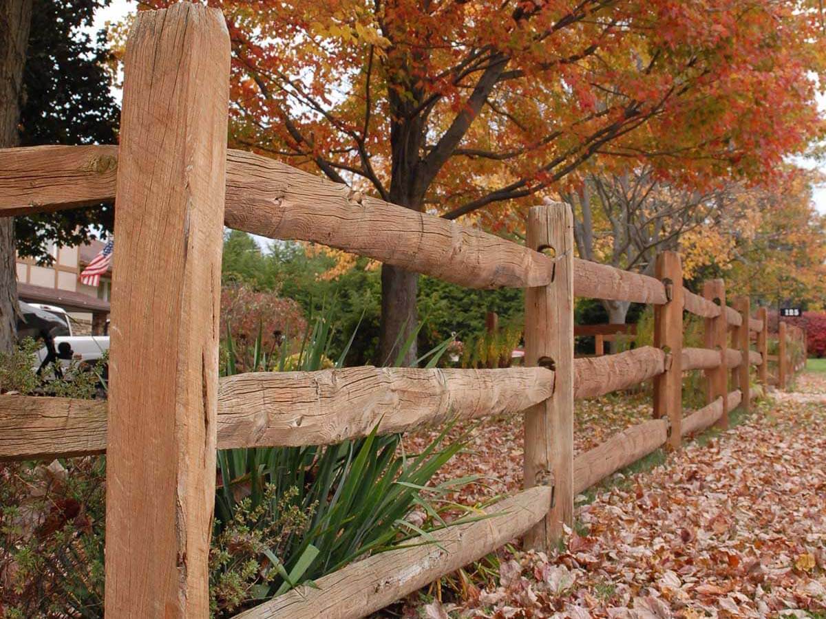 Split rail wood fence installed around a home in Western Pennsylvania